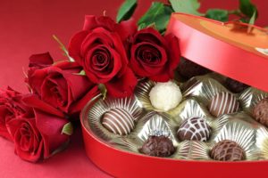 Chocolates and rose flowers