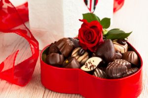 Sweet chocolate in red heart box