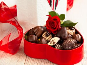 Sweet chocolate in red heart box