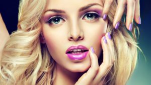 Beautiful Blonde Girl With Lilac Makeup