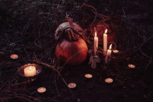 Jack O Lantern Beside Candles Halloween Decor