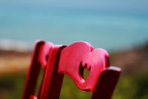 Red Wooden Chair Close Up Photography