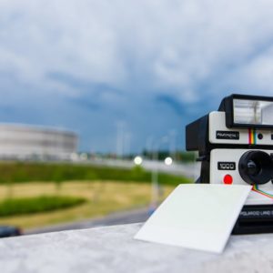Black and White Polaroid Instant Camera With Photo Paper