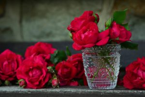 3 Red Rose on Glass Container