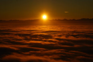 Sunrise above Clouds 4K Wallpapers