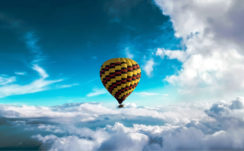Hot air balloon above clouds 5K Wallpapers
