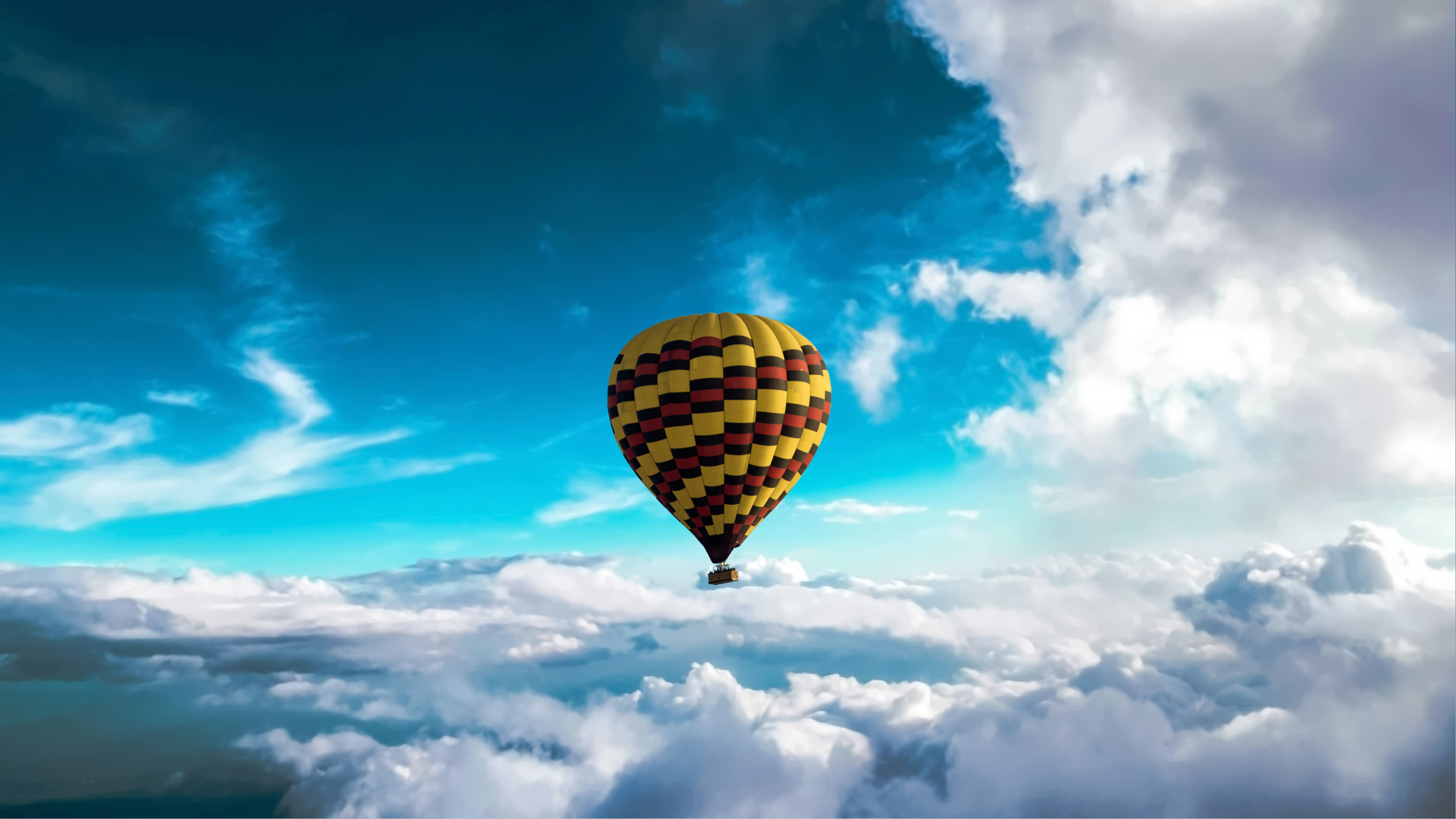 Hot air balloon above clouds 5K Wallpapers