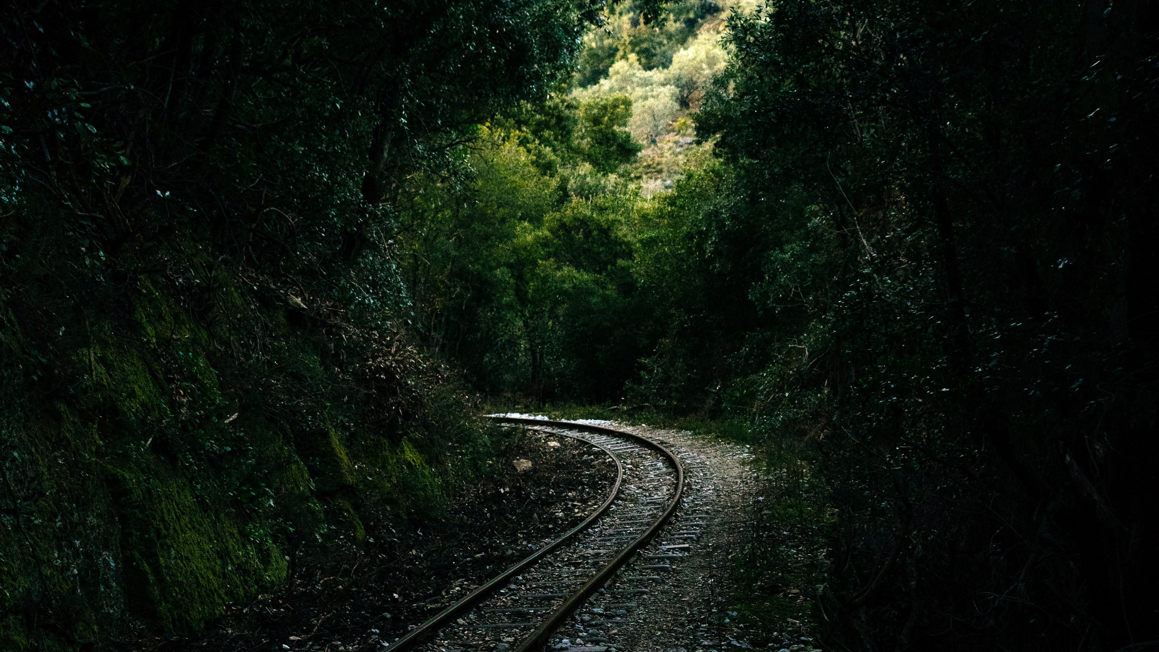 Railroad tracks on a mountain path 4K