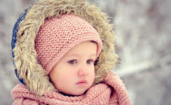 Cute Baby Girl In Blur Background Wearing Woolen Netted Dress And Muffler HD Cute