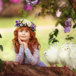 Little Cute Girl Is Holding Face With Hand Looking Up Leaning On Tree Trunk With Pigeon Nearby Wearing Redhead Wreath HD Cute Wallpapers