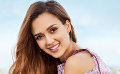 Smiley Jessica Alba Is Facing One Side In Blur Blue Background HD Jessica Alba Wallpapers