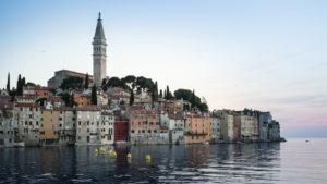 Croatia Rovinj Tower In The Middle Of Buildings Near River HD Travel