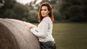 Anna Magdalena Girl Model White Top Grey Pant Pose Photoshoot Nature Blur Background HD Girls Wallpapers