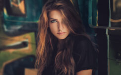 Stunning Nice Beautiful Girl Model Pose Blur Colorful Background Look Black Dress HD Girls Wallpapers