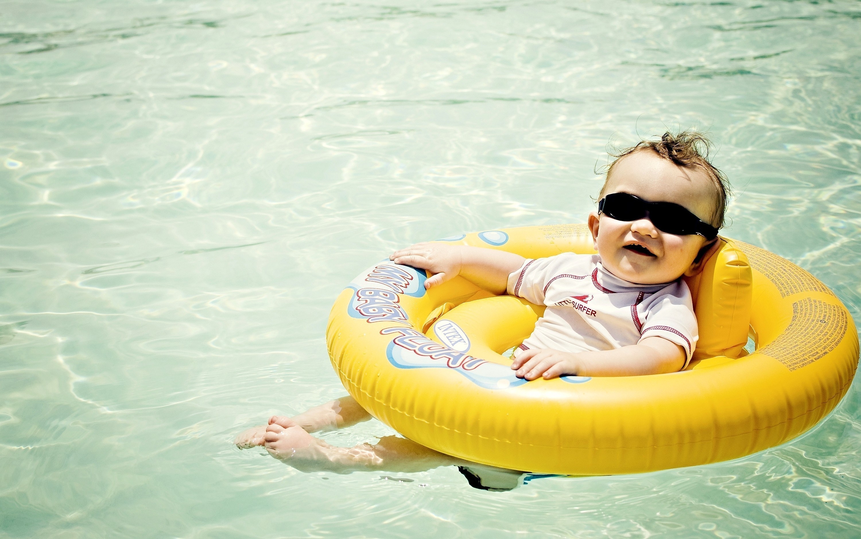 Baby, Life buoy, Swimming pool, Sun glasses